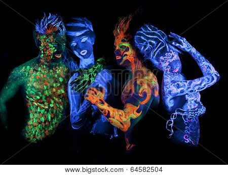 Body art glowing in ultraviolet light