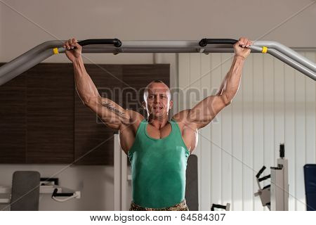 Bodybuilder Doing Pull Ups Best Back Exercises
