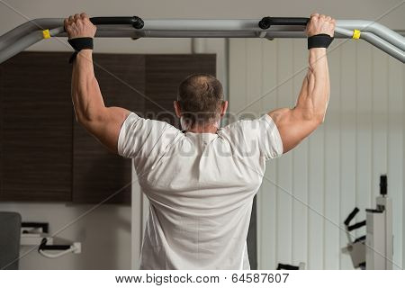 Male Athlete Doing Pull Ups