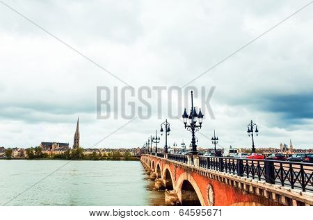 Old stony bridge in Bordeaux, France Europe