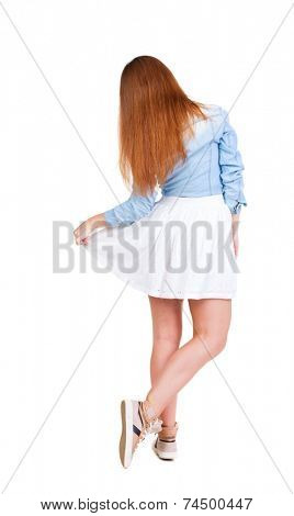 back view of standing young beautiful  woman makes a curtsey. Rear view people collection.  backside view of person.  Isolated over white background.