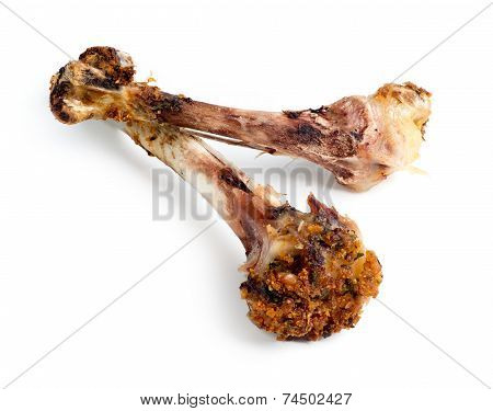 Closeup Of Cooked Chicken Bones Isolated Against White