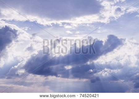 Sun Rays Among Clouds