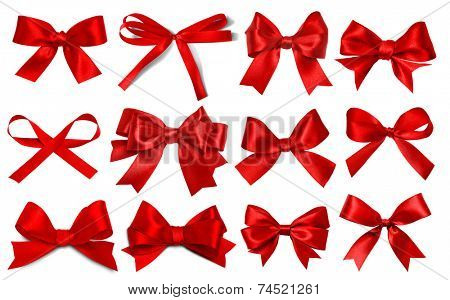 Shiny red satin ribbon on white background