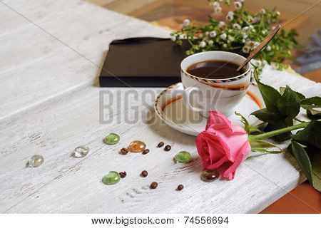 Cup Of Coffee With Rose And Wildflowers