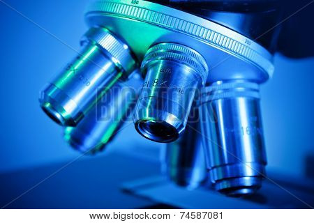 A close-up of a microscope