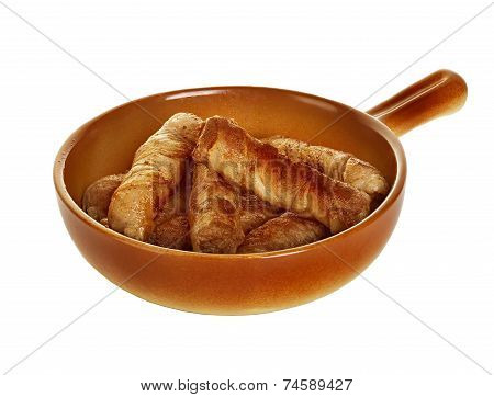 Sausages Wrapped In Bacon In A Frying Pan, Chevapchichi On White Background