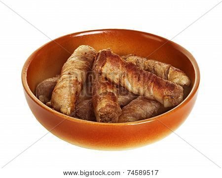 Sausages Wrapped In Bacon In A Frying Pan, Chevapchichi On White Background