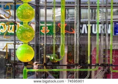 Tourists Watching A Water Clockwork In The Europa Centre Of Berlin