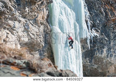 Climber Ascends The Vertical Icefall
