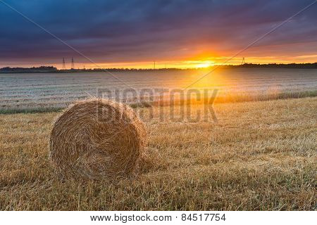 Straw Bales On Field Against Sky