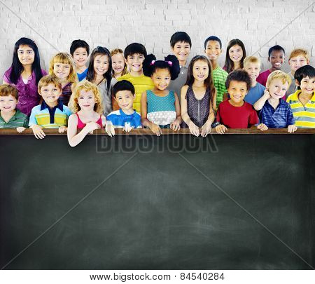 Multi-Ethnic Group of Children Holding Empty Billboard
