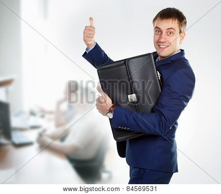 Successful businessman thumbs up