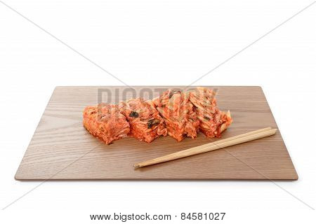Red Gimchi On A Wooden Plate
