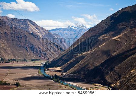 Peruvian landscape with a river and mountains in a sunny day
