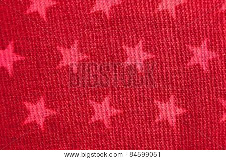 Pink stars on red background