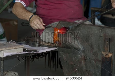 Glasswork artisan make glass horse