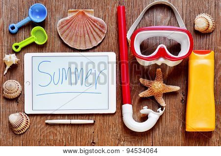 high-angle shot of a rustic wooden table full of summer stuff, such as a starfish, some seashells, a diving mask and a snorkel, a bottle of sunblock and a tablet with the word summer written in it