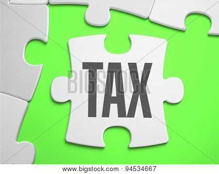 Tax - Jigsaw Puzzle with Missing Pieces.