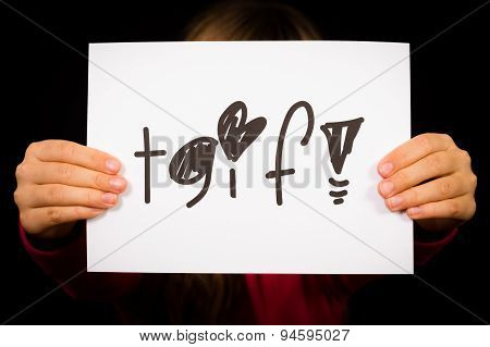 Child Holding Tgif Sign