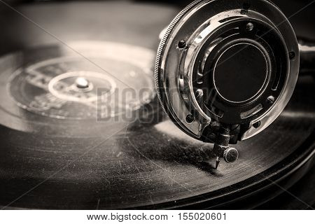 Old Grammophone playing close up macro shot in Sepia Tones