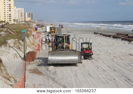 JACKSONVILLE EACH, FL - OCTOBER 29, 2016: Beach renourishment project underway in Jacksonville Beach. The project cost is over $13.5 million and 61% is funded federally.