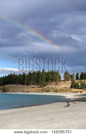 Tekapo, New Zealand - February 2016: People Relaxing By Lake Tekapo, South Island Of New Zealand, Wi
