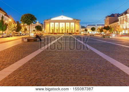 The area around the town hall in night lighting in the historic center of the old town. Lithuania. Vilnius.