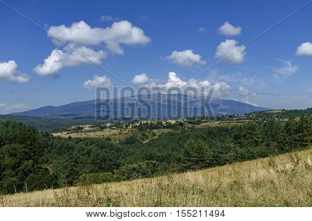 Panoramic view of advance summer with village Plana in the mountain Plana by Vitosha, Bulgaria