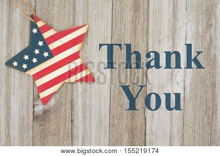 USA patriotic thank you message USA patriotic old flag on a star with weathered wood background with text Thank you for your service