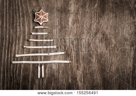 Nostalgic hndmade Christmas tree decoration and copy space