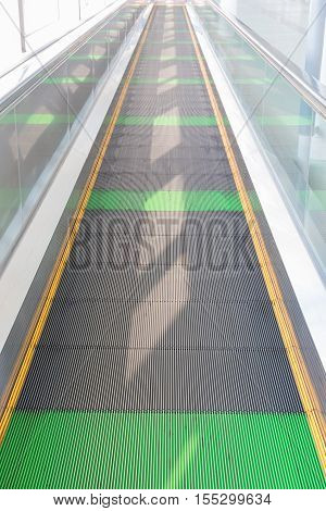 Long Walkway Of Escalator At International Airport.