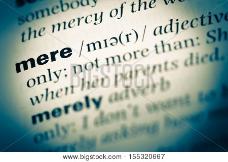 Close Up Of Old English Dictionary Page With Word Mere