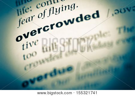 Close Up Of Old English Dictionary Page With Word Overcrowded