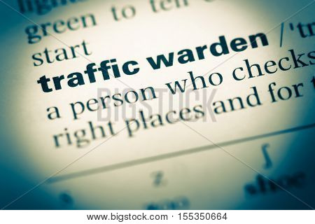 Close Up Of Old English Dictionary Page With Word Traffic Warden