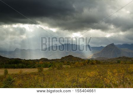 Sunbeams over the Lofoten landscape Laukvik Norway