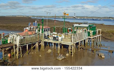 FELIXSTOWE, SUFFOLK, ENGLAND - NOVEMBER 06, 2016: Houseboat Dwelling in the mud flats near the estuary of the river Deben Suffolk.