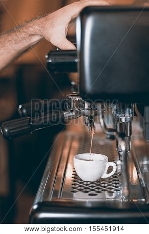 Espresso Machine Making Coffee, Golden Espresso Flowing. Coffee Espresso