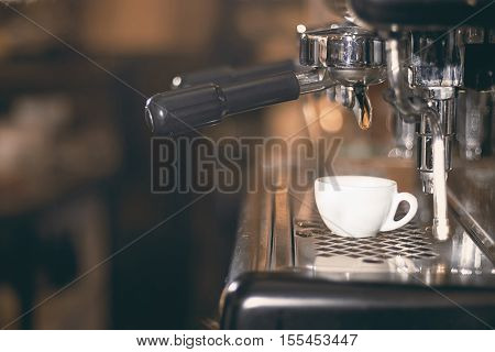 Coffee Espresso. Espresso Machine Making Coffee, Golden Espresso Flowing.