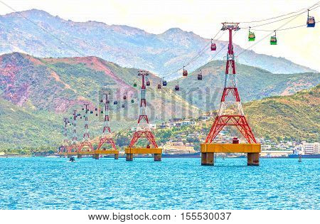Nha Trang, Vietnam - July 29th, 2016: Cable car to Vinpearl amusement park in the morning sunshine to attract tourists to the weekend relaxing in Nha Trang, Vietnam