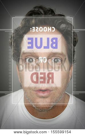 Dumbfounded Looking Man In Front of Touch Screen Deciding on Blue or Red.