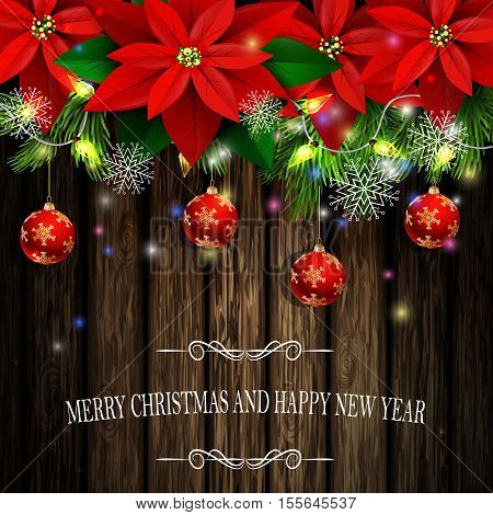 Christmas decoration and greeting card with evergreen trees with poinsettia christmas balls isolated on wooden wall with lights