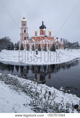 Cathedral and the river Polist Staraya Russa at the winter background