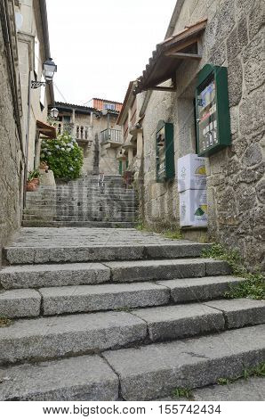 COMBARRO, SPAIN - AUGUST 4, 2016: Stone steps in street in Combarro a village of the province of Pontevedra in the Galicia region of Spain.