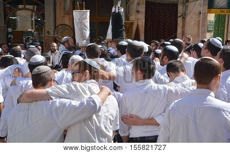 JERUSALEM ISRAEL 26 10 16: Jewish man celebrate Simchat Torah. Simchat Torah is a celebratory Jewish holiday marks the completion of the annual Torah reading cycle.