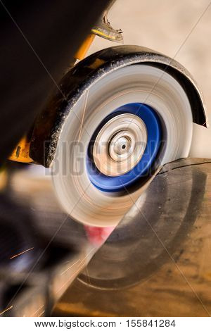 Cutting Steel With Angle Grinder At Car Service