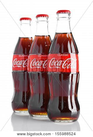LONDON UK - NOVEMBER 07 2016: Classic bottles Of Coca-Cola on white background with frost