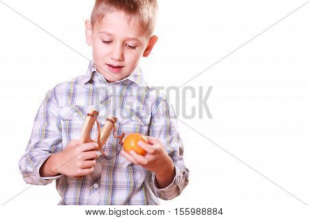 Young Boy Use Sling Shot Shoot Mandarine.