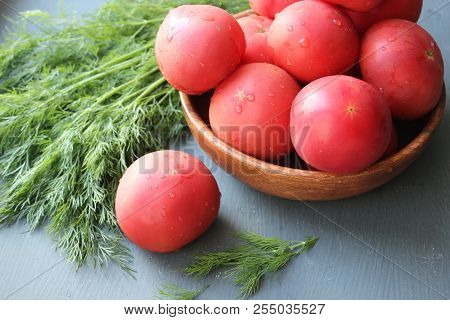 Fresh Red Ripe Tomatoes And Fresh Dill Greens For Salad Making, Close-upn