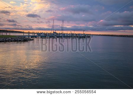 Sailing Sunset Sky Background.. Michigan Marina Along The Great Lakes Coast With A Beautiful Sunset 